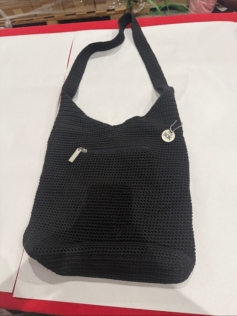 The Sak Black Crochet Shoulder Bag with Front Zip Pocket